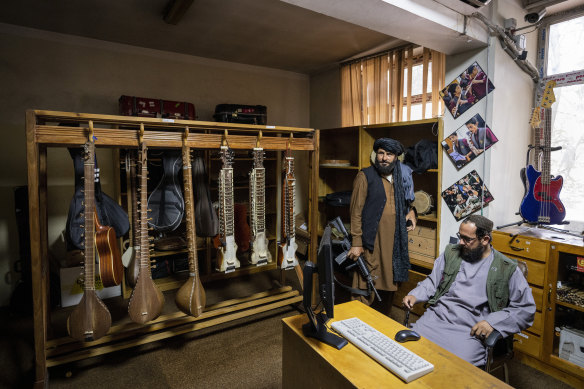 Fighters from the Haqqani network inside a room of the Afghanistan National Institute of Music in Kabul.