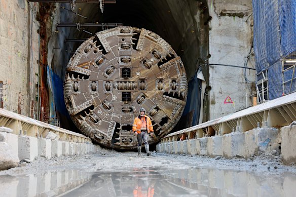 A construction worker walks near the tunnel-boring machine named Dorothy.