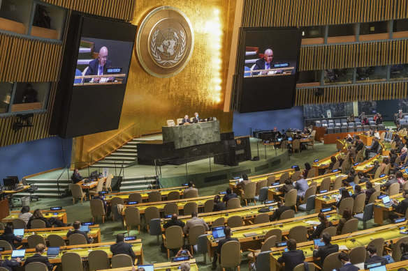 Live video monitors show United Nations Ambassador from Russia, Vasily Nebenzya, addressing the UN  General Assembly before a vote on a resolution condemning Russia’s illegal referendum in Ukraine.