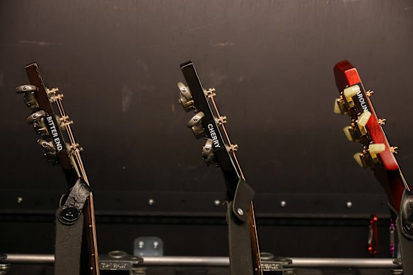 Each guitar backstage is labelled with the name of the Neil Diamond song that is played on it during the show.
