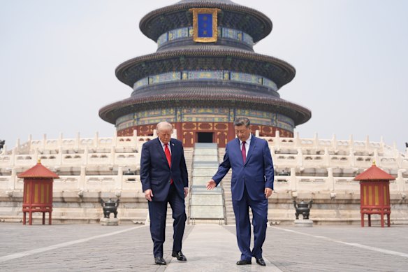 Trump joins Xi outside the Temple of Heaven.