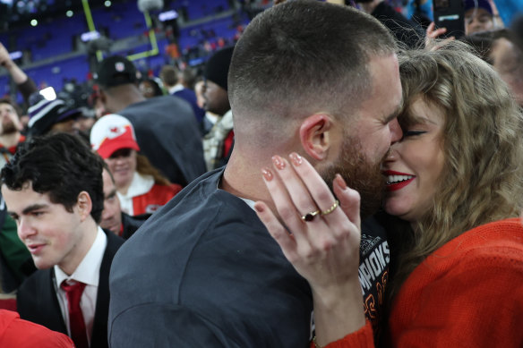 Travis Kelce embraces Taylor Swift after the Kansas City Chiefs defeated the Baltimore Ravens,