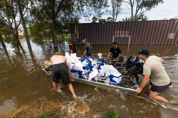 Residents ship sandbags in Echuca, on the Victorian side of the border with NSW.