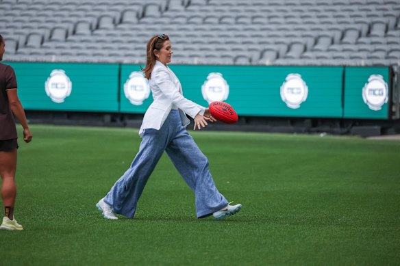 Queen Mary proved there’s still some Aussie in her, the royal tried her hand at kicking a footy. 