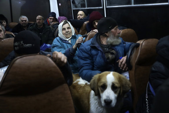 People from the town of Soledar wait to be transported to temporary accommodation near Shakhtarsk, in Russian-controlled Donetsk region.