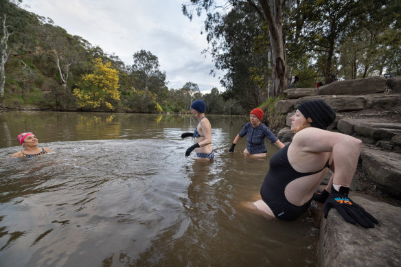 The Yarra Yabbies brave the cold and water quality year round to swim in the river. 