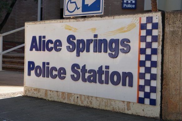 Handprints on the front of the Alice Springs police station this week.