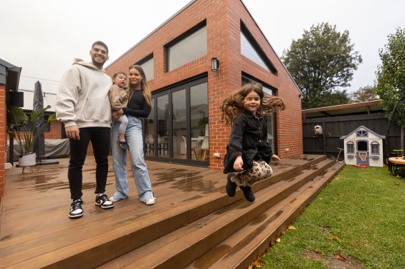 Hass Milaki and Anna West with their children Sahara and Zayn at their Cheltenham home, which is now on the market.