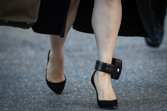 Meng Wanzhou, chief financial officer of Huawei Technologies, wears a GPS ankle monitor as she returns to the Supreme Court.