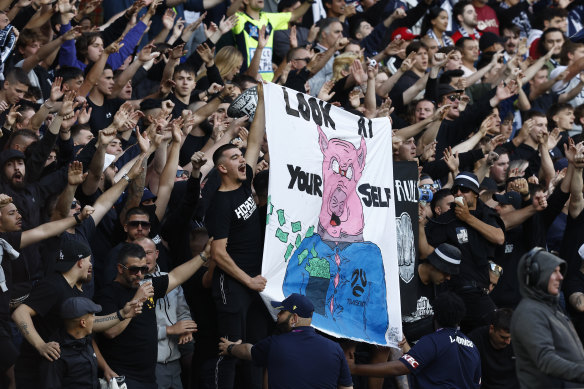 Fans show their disappointment with the APL before the Melbourne derby at AAMI Park.