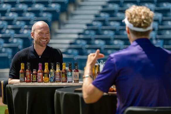 Sean Evans hosts Will Ferrell on new Netflix spin-off Hot Ones: Extra Heat.