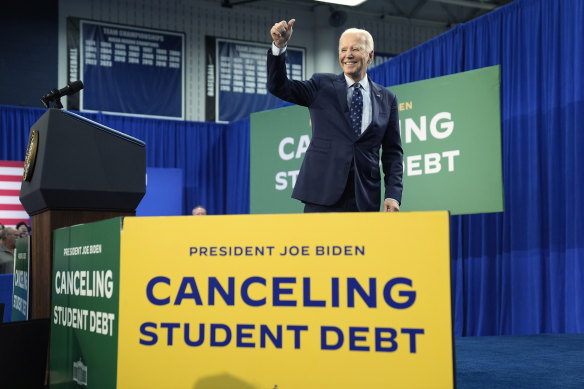 President Joe Biden arrives at Dane County Regional Airport for an event on student loan debt in Madison, Wisconsin.