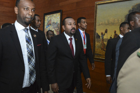 Ethiopia's Prime Minister Abiy Ahmed (centre) arrives at the African Union Summit in Addis Ababa in February.