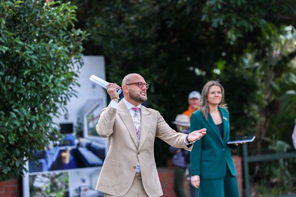 Jellis Craig Northcote auctioneer Sam Rigopoulos calls for final bids.