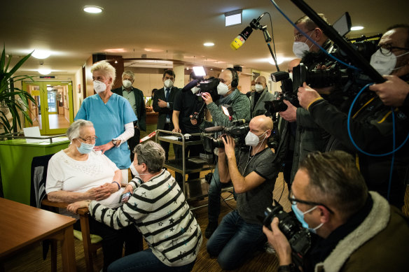 The European Union began vaccinations on Sunday, December 27, with plenty of fanfare, such as this moment at a Dessau care home. 