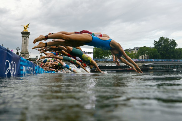 Taking the plunge into the Seine in the women’s triathalon at the Paris Olympics.