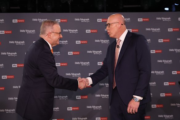 Prime Minister Anthony Albanese and Opposition Leader Peter Dutton shake hands before their debate on April 8.