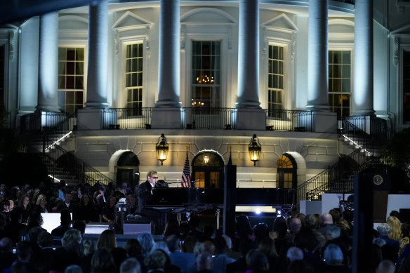 Elton John performs on the South Lawn of the White House  in a show he called “A Night When Hope and History Rhyme,” a reference to a poem by Irishman Seamus Heaney that President Joe Biden often quotes. 