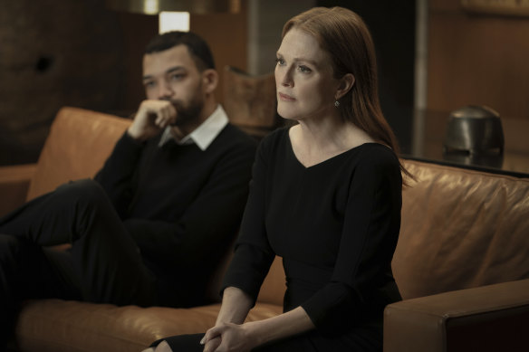 Justice Smith (left) and Julianne Moore are caught in a web of deceit in  Sharper. 