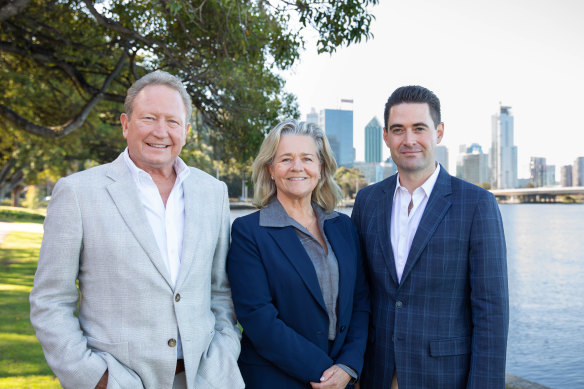 Andrew and Nicola Forrest with Minderoo boss John Hartman on the banks of the Swan River in Perth near the charity’s office.