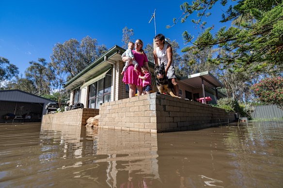 Aimee and Chris Lindrea and their children at their Rochester home on Tuesday.
