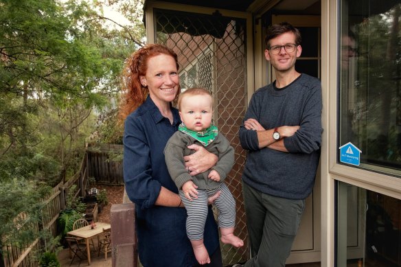 Maddie (left), Matt (right) and baby Duncan (centre) feel the housing market is getting out of hand.