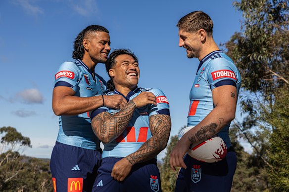 Zac Lomax with Stephen Crichton and Brian To’o.