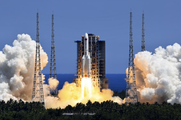 The Long March 5B Y3 carrier rocket, carrying Wentian lab module blasts off from the Wenchang Space Launch Centre.
