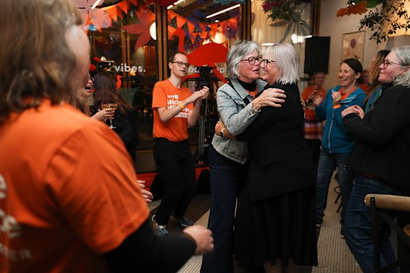 Milthorpe embraces a supporter on the night of the Farrer byelection.