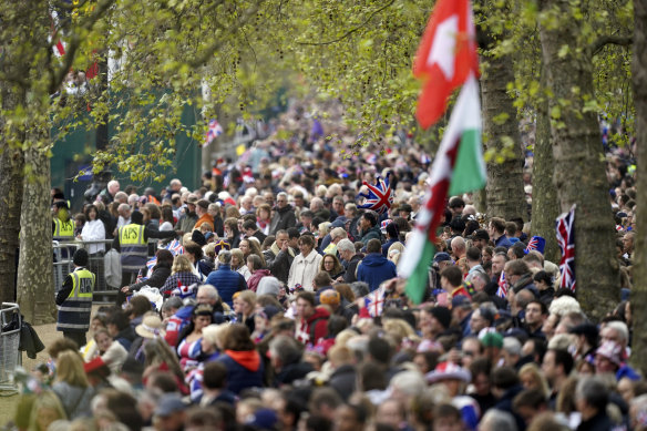 The crowd gather along The Mall, ahead of the King Charles and Camilla’s coronation ceremony at Westminster Abbey.