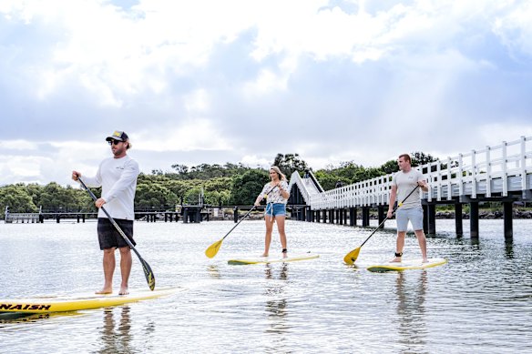 Stand-up paddleboarding along Back Creek, South West Rocks.