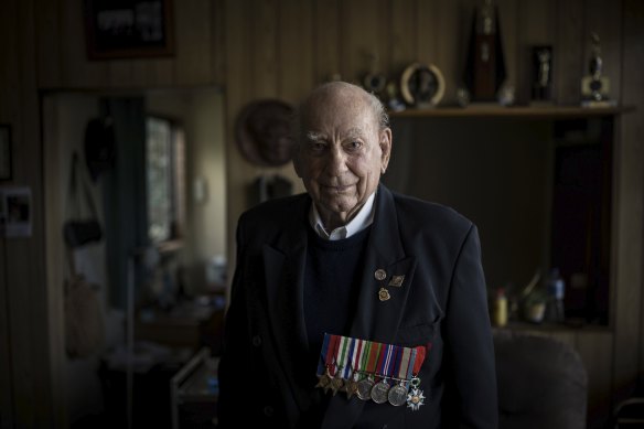 World War II veteran Herbert “Bert” Biggs in the home he built in 1949.