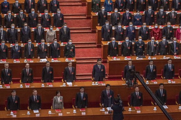 President Xi Jinping (second row, centre) with other delegates during last year’s National People’s Congress.
