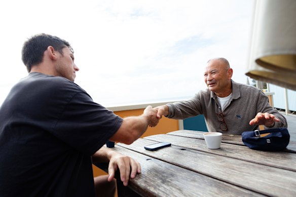 Eddie Jones shakes hands with the Herald’s Tom Decent after a 45-minute interview.