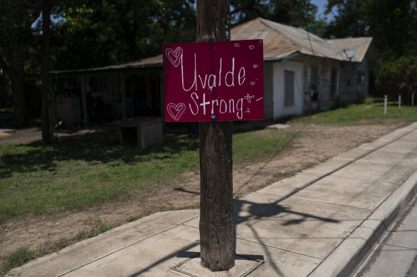 A “Uvalde Strong” sign is posted on an electric pole in Uvalde, Texas.