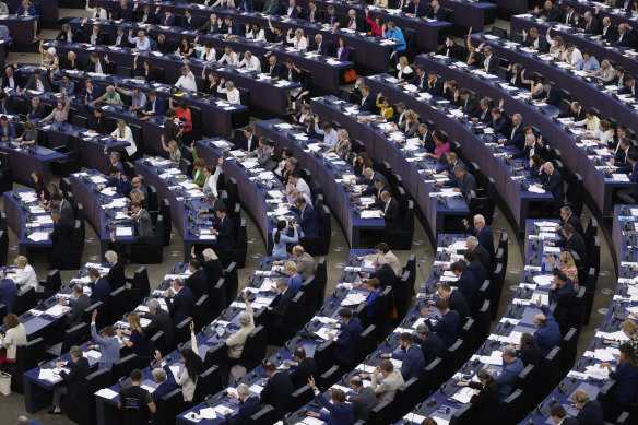 EU parliamentarians vote on the Artificial Intelligence act at the European Parliament in Strasbourg, eastern France. 