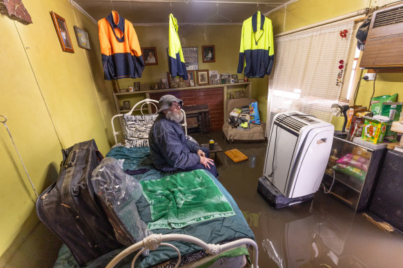 The 71-year-old’s house is about 300 metres from the end of the levee and was not spared the floodwater.