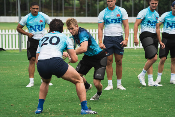 Max Jorgensen takes on the defence at Waratahs training.