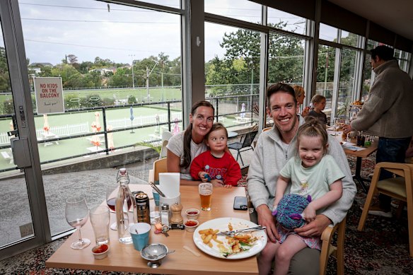Paul and Abi Jolley enjoy a meal at the RSL with Darcy, 2, and Andie, 4.