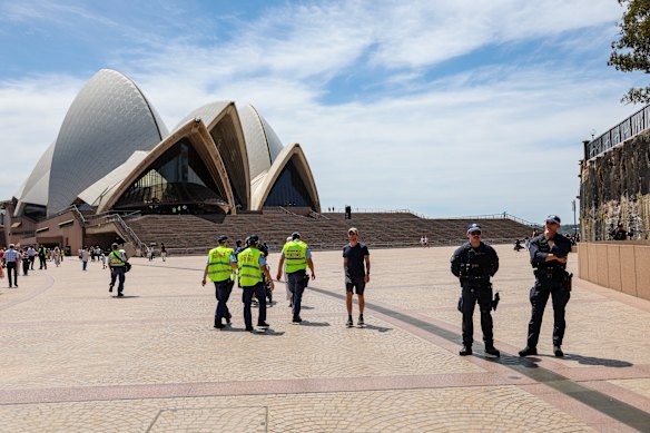 Police maintained a heavy presence in and around the Opera House on Sunday.