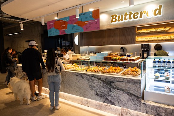 Buttered’s wide range of fresh pastries are displayed at the counter.