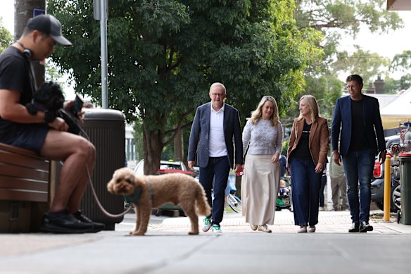 The prime minister walks to Bar Italia with fiancee Jodie Haydon, Finance Minister Katy Gallagher and Bennelong MP Jerome Laxale.
