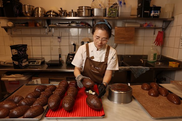 Jin Sun Kim, owner at Kakawa Chocolates, making Easter eggs at her shop in Darlinghurst. 