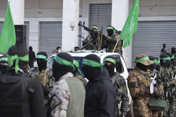 Hamas fighters are deployed in central Gaza City ahead of the planned release of four Israeli soldiers. 
