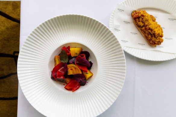 Entrées of heritage beetroot, goat’s curd and walnut salad with fermented honey dressing and yellowfin crostini.