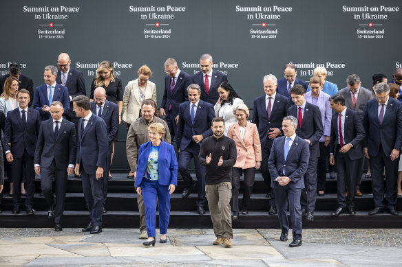 Ukrainian President Volodymyr Zelensky (centre-right) with heads of states after a group picture during the summit on peace in Ukraine in Switzerland.