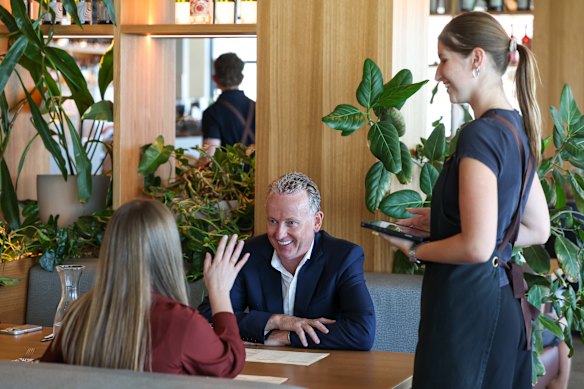 WAtoday reporter Jesinta Burton and Momentum Wealth founder Damian Collins at Longview Cottesloe.
