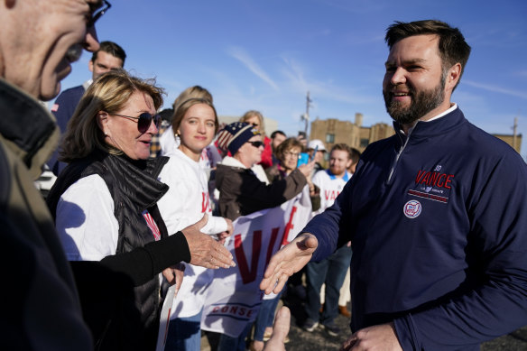 Ohio Senate candidate JD Vance meets with supporters after casting his ballot..