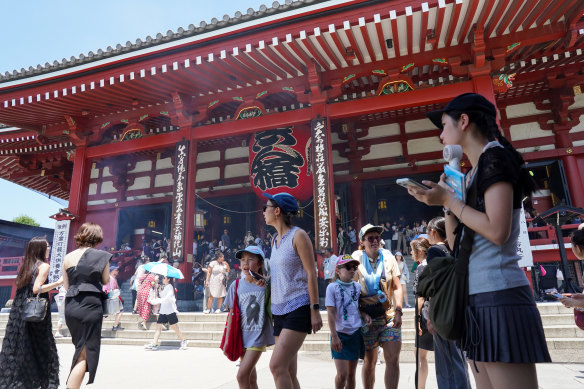 Hotter than July: Soaring temperatures have not deterred crowds from Tokyo’s famous Sensoji Temple.