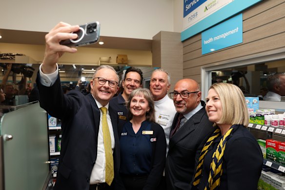 A lighter moment: Albanese takes a selfie with Bell Street Pharmacy staff and Wills MP Peter Khalil (second from right).